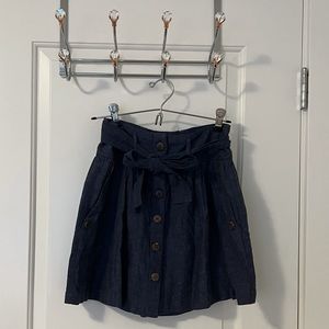 Navy Jean Like Ribbon Skirt. Size Small but can fit up to Medium.